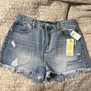NWT Elan frayed denim shorts size large. 14” long and 3” inseam.